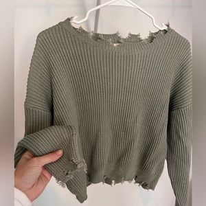 Cropped distressed sweater